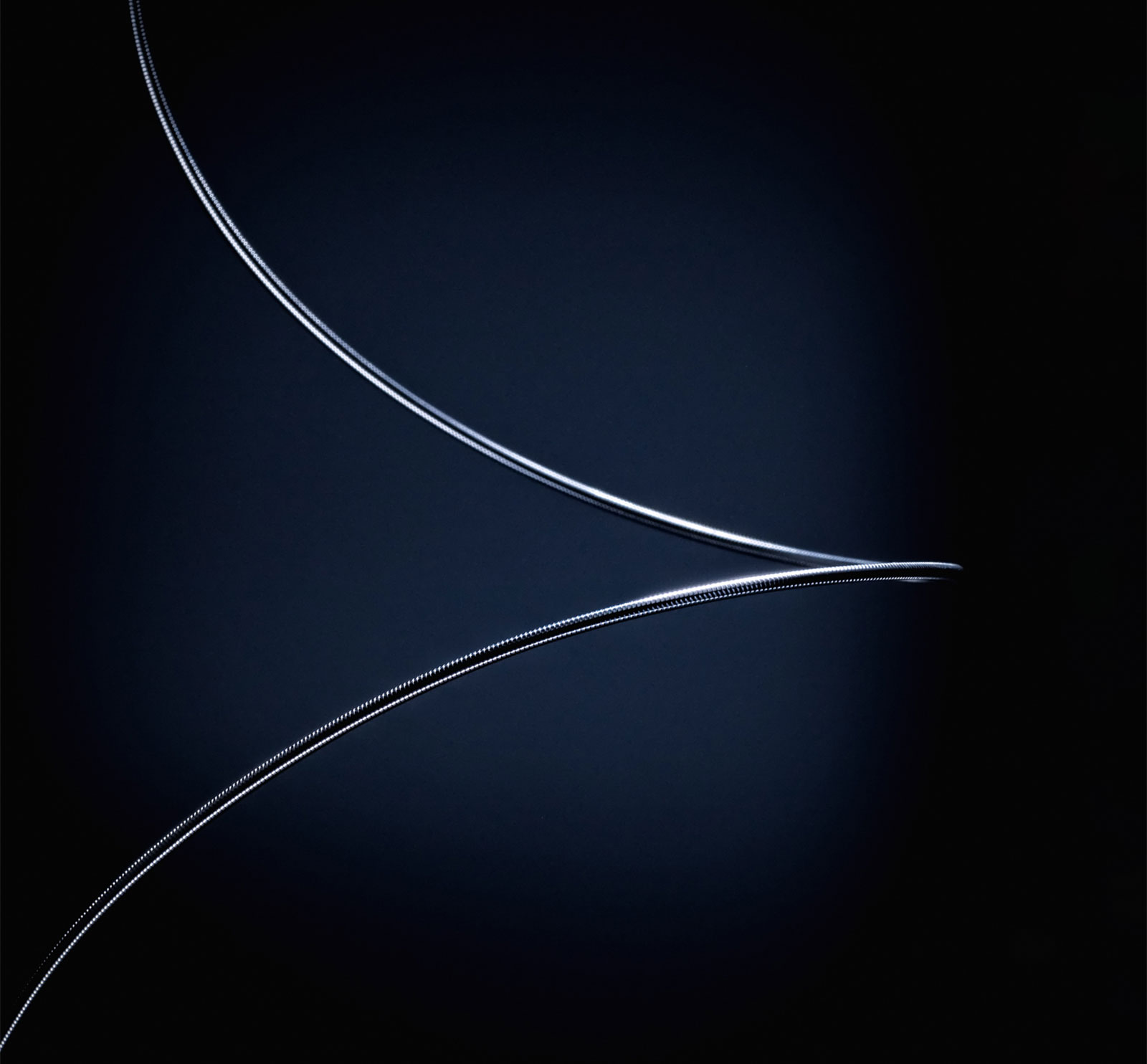 Image of a suspended wire coil.